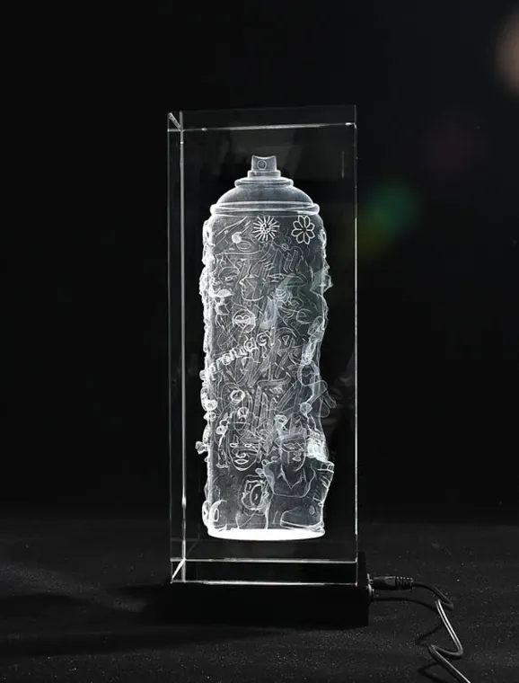 Spray can etched inside a lit glass block